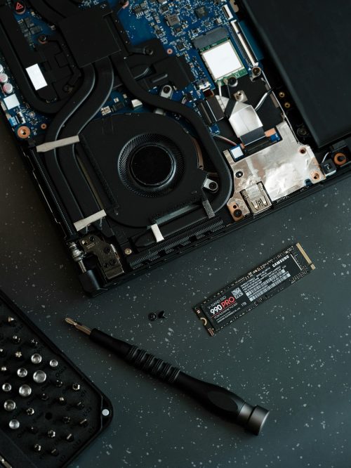Photograph of a laptop undergoing a hard drive upgrade